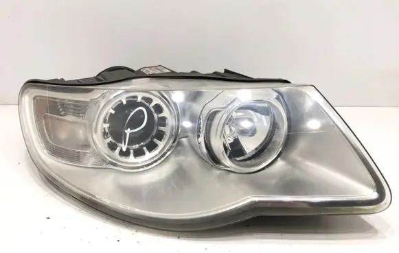 Volkswagen Touareg I Headlight/headlamp 7L6941040