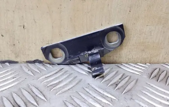 Front door lower hinge