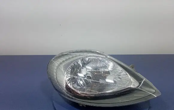 Nissan Primastar Headlight/headlamp 7700311372