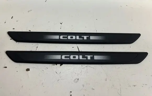 Mitsubishi Colt VII Foot area side trim MZ315429