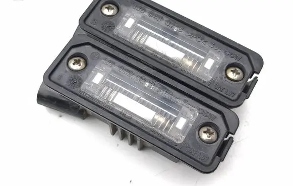 Volkswagen Golf V Number plate light 1J6943021B