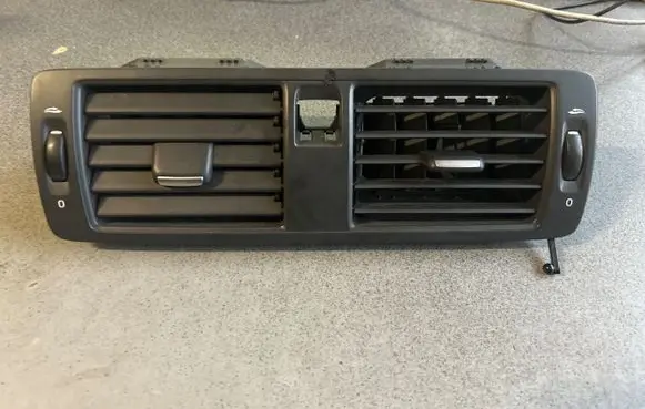Dash center air vent grill