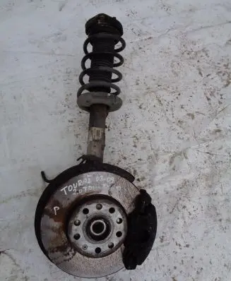Volkswagen Touran I Front wheel hub spindle knuckle 1K0400054CD