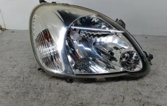 Toyota Yaris Headlight/headlamp 89007613