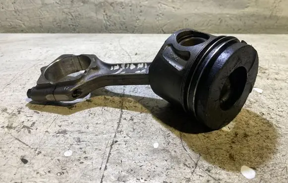 Piston with connecting rod