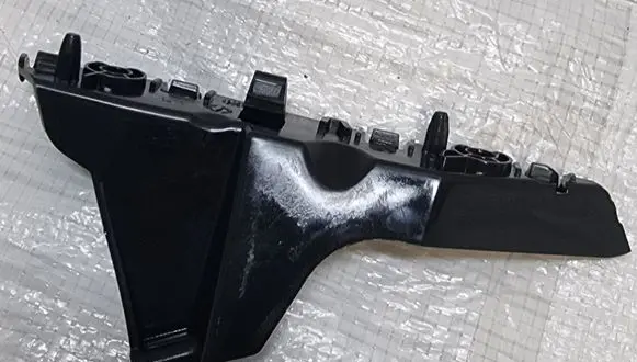 Opel Corsa F Front bumper mounting bracket 9829335680