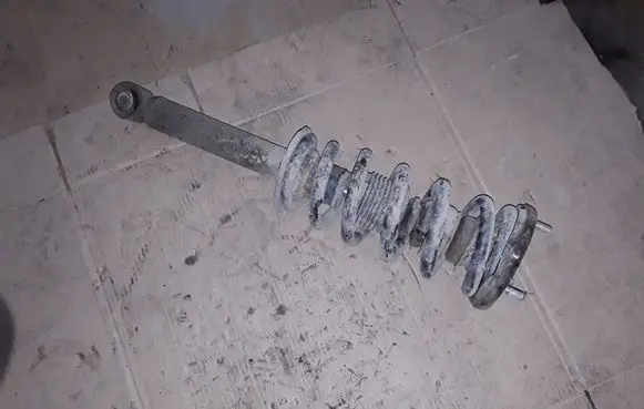 Mitsubishi Pajero Front shock absorber with coil spring 4062A024