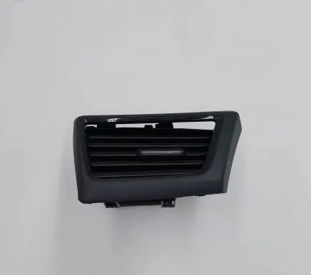 Nissan Leaf II (ZE1) Dash center air vent grill 687605SA0B