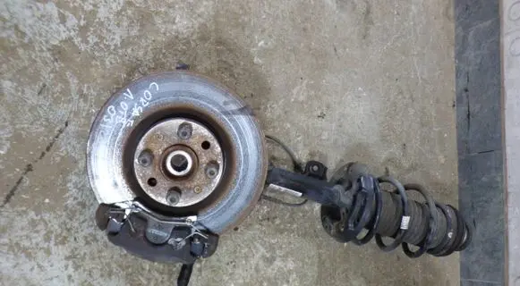 Opel Corsa E Front shock absorber with coil spring 13434132 22286409