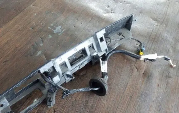 Nissan Note (E11) Trunk door license plate light bar P222910SR
