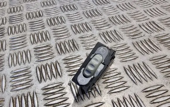 Headlight level height control switch