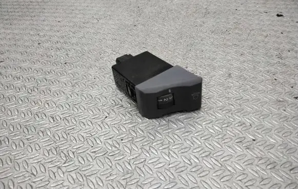 KIA Carens I Headlight level height control switch
