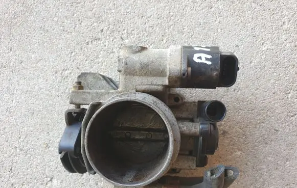 Opel Tigra A Throttle valve 90501011 C10164