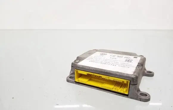 Volkswagen PASSAT B5 Airbag control unit/module 1J0909607 5WK4199