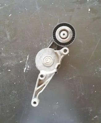Volkswagen Golf Plus Generator/alternator belt tensioner 03G903315