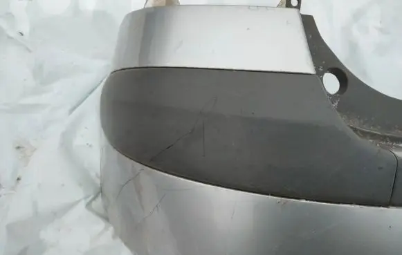 Rear bumper trim bar molding