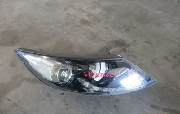 KIA Sportage Headlight/headlamp 921023U270 UR27A07550 01130404