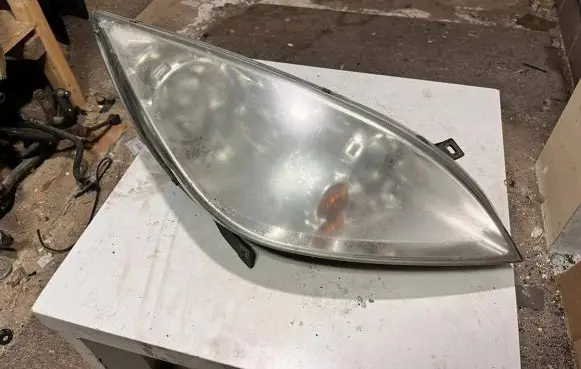 Mitsubishi Colt Headlight/headlamp MR957354 0301208202