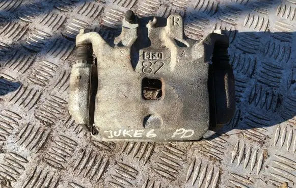 Nissan Juke I F15 Front brake caliper