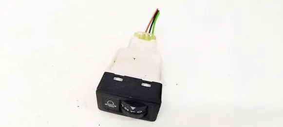 Suzuki Swift I Headlight level height control switch