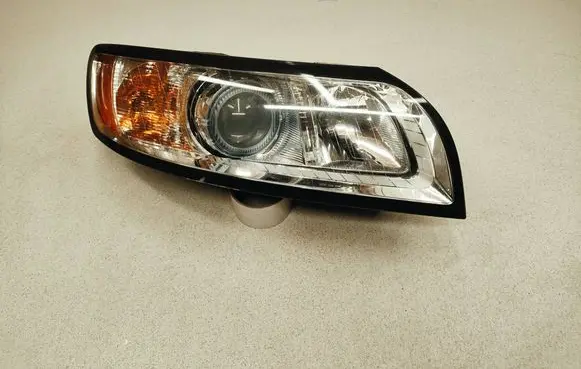 Volvo V50 Headlight/headlamp 31265699 LE06A6152X 0301237272