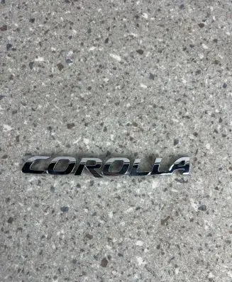 Toyota Corolla E160 E170 Manufacturers badge/model letters 7544202300