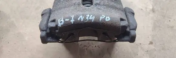 Volkswagen PASSAT B7 Front brake caliper