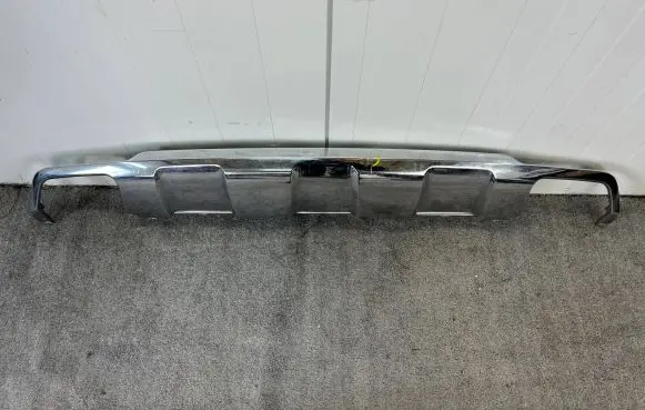 Rear bumper trim bar molding