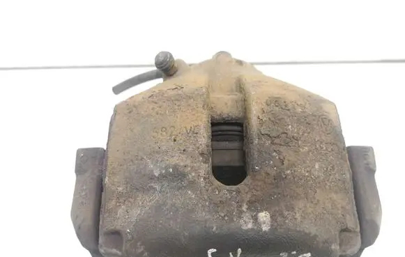 Volkswagen Golf V Front brake caliper 582