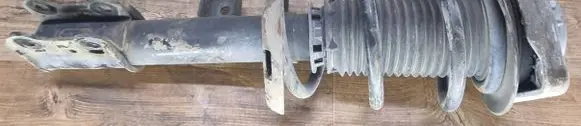 Front shock absorber with coil spring
