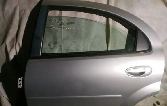 Chrysler Sebring (ST-22 - JR) Rear door PILKOS