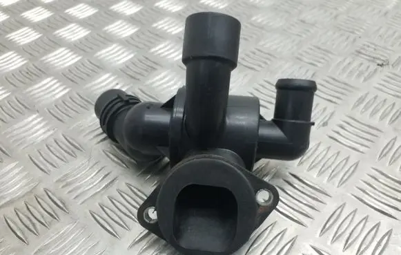 Thermostat/thermostat housing