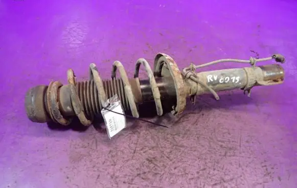 Volkswagen Golf IV Front shock absorber with coil spring