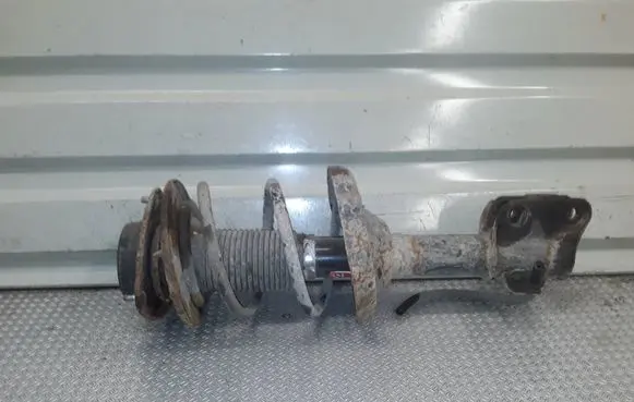 Subaru Impreza III Front shock absorber with coil spring