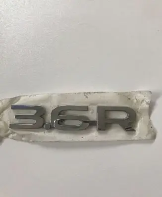 Subaru Legacy Rear loading door model letters 93079AL040