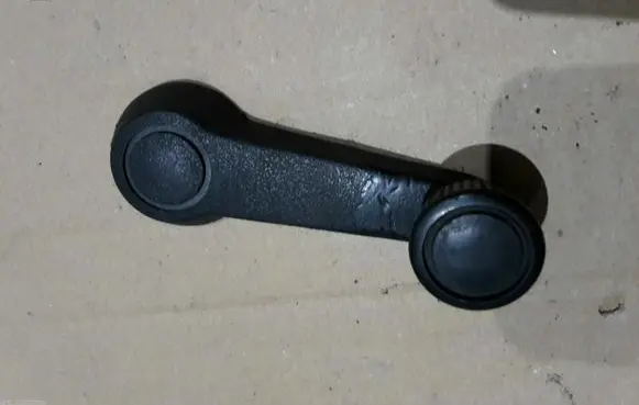 Volkswagen Golf I Front door window winding handle 111837579B