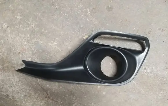 Suzuki Swift III Front fog light trim/grill 7176152R2
