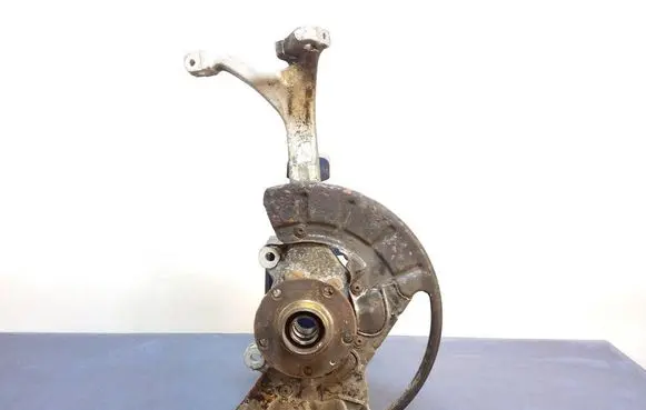 Front wheel hub spindle knuckle