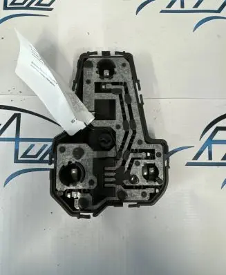 Tail light bulb cover holder