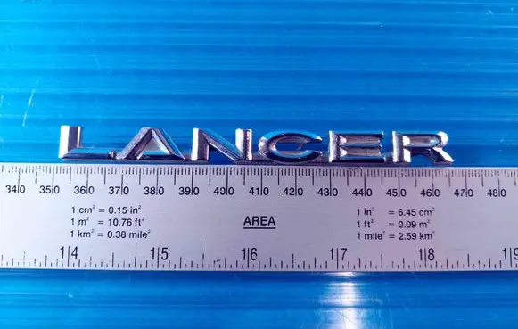 Mitsubishi Lancer X Manufacturers badge/model letters 