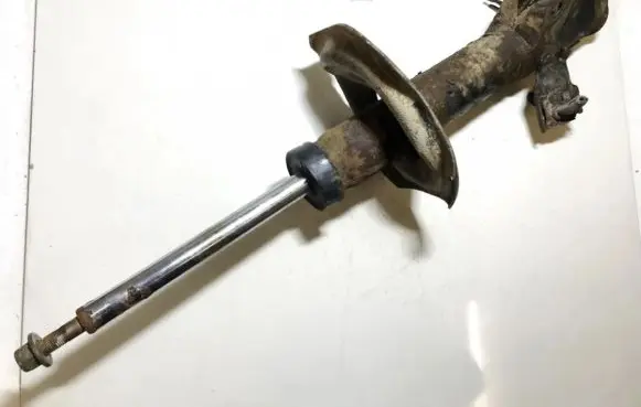 Nissan Almera Tino Front shock absorber/damper