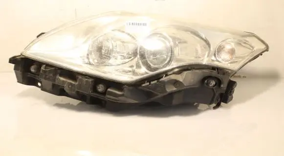 Renault Laguna III Headlight/headlamp 89910838