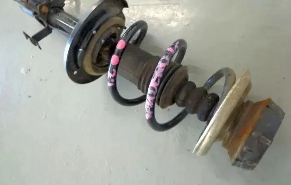 Dacia Sandero Front shock absorber with coil spring