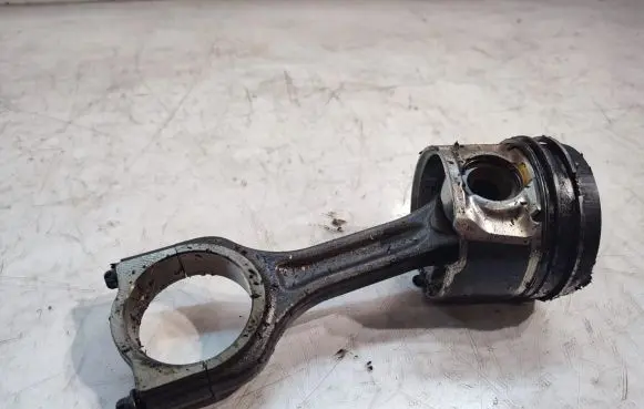 Piston with connecting rod