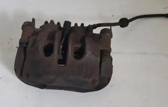 Opel Movano B Front brake caliper 410105039R A51006