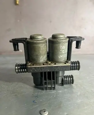 Coolant heater control valve