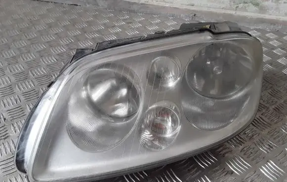 Volkswagen Touran I Headlight/headlamp 1T0941005D 0301205201
