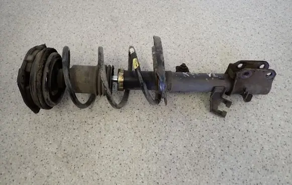 Nissan Micra Front shock absorber with coil spring 