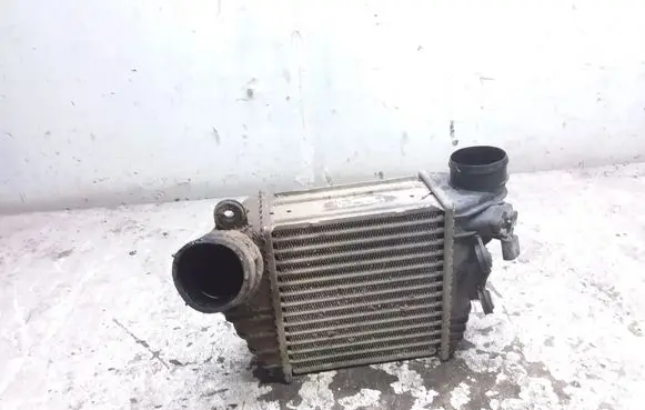 Volkswagen Golf IV Intercooler radiator 1J0145803