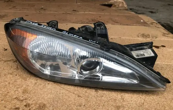 Nissan Primera Headlight/headlamp 260109F611
